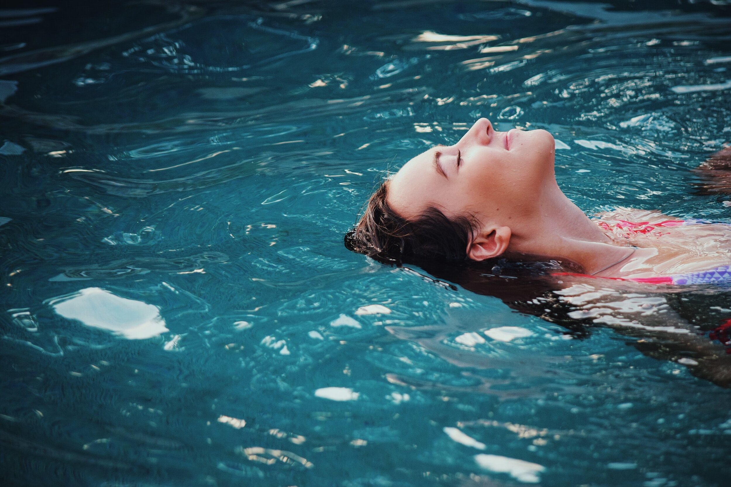 girl swimming in pool